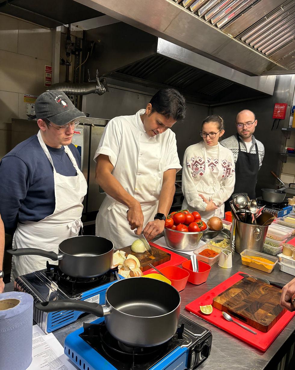 Dev Biswal leading Indian cookery classes in Canterbury
