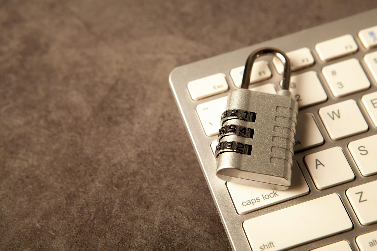 EU AI data access privacy concerns illustrated by a security lock on a computer keyboard.