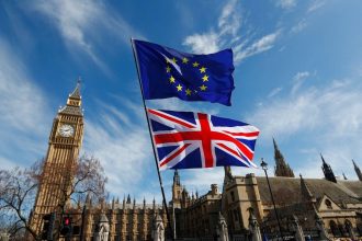 UK and European Union flags representing closer UK EU relations after a new public poll