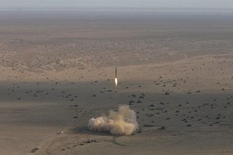 Iran missile threat highlighted by ballistic missile launch during military test