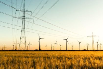 Wind turbines and electricity infrastructure illustrating EU Energy Relief and European energy security.