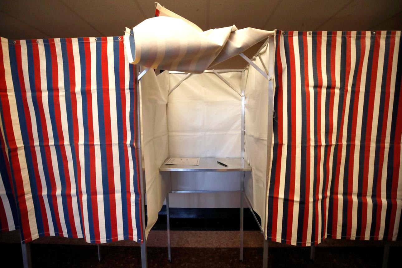 US midterm elections voting booth representing the battle for control of Congress.