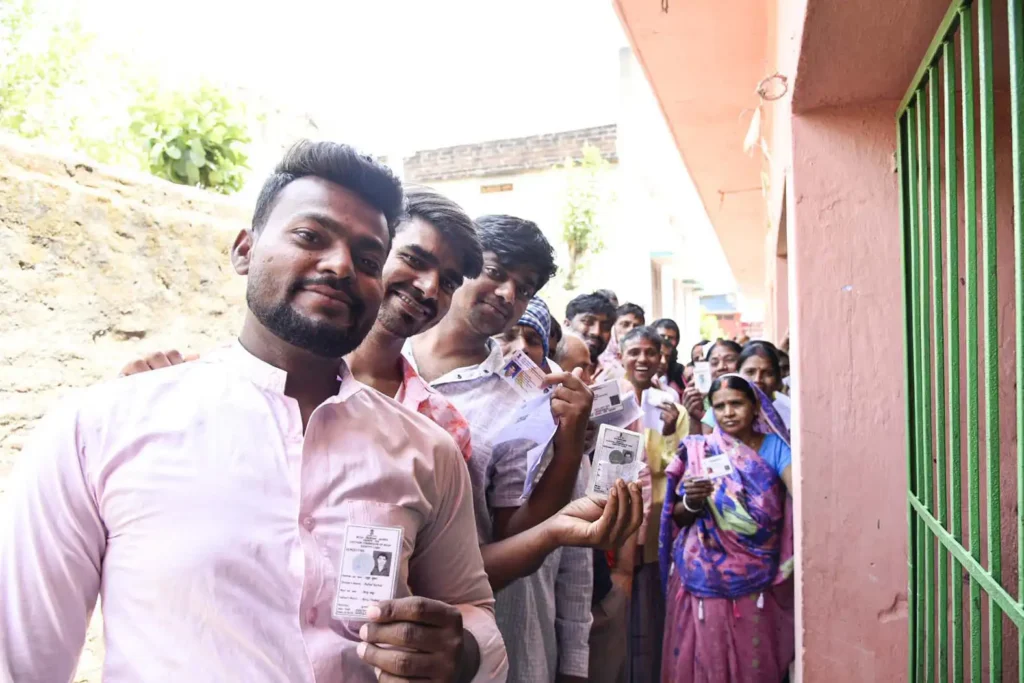 voters showing indetity cards