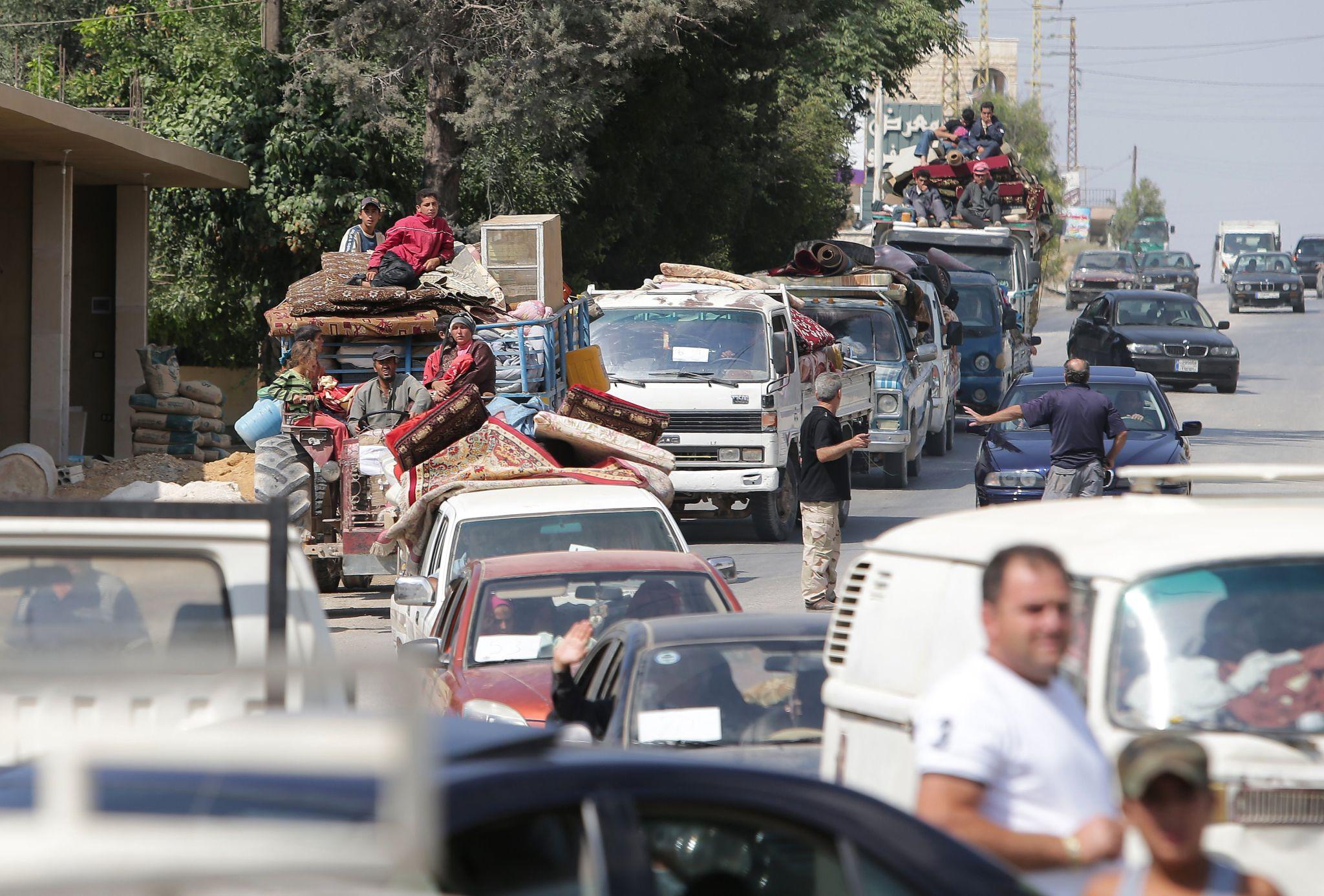 displaced families evacuating villages during Lebanon war displacement emergency