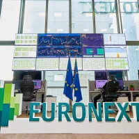 Stock market revenue increase reflected on Amsterdam trading floor screens in 2026