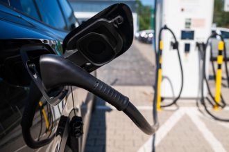Electric vehicle charging in Europe as China-EU EV talks address automotive tariffs and market competition.